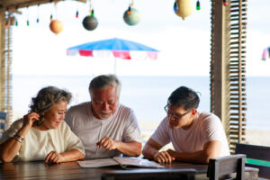 family reading a menu at a restaurant