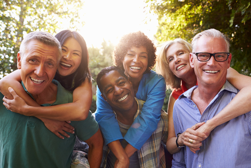 Group of adults with diabetic retinopathy smiling